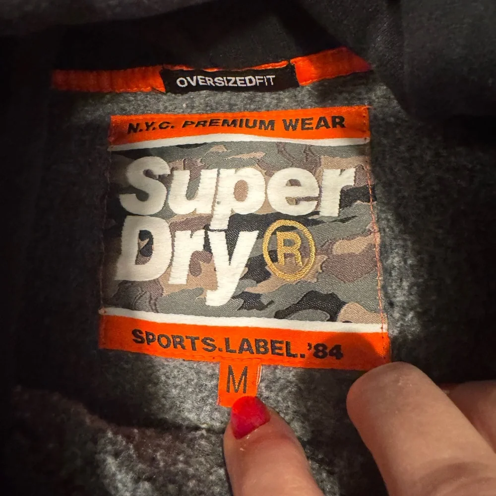 Superdry Black Pullover Hoodie with White Logo and Paint-Splatter - Picture 5 of 9